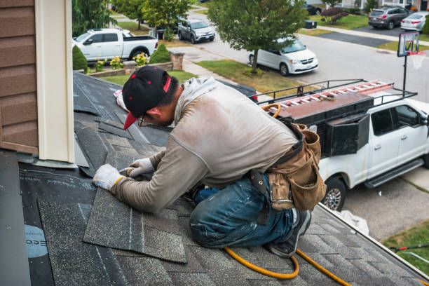 Professional Storm Damage Roof Repair technician working in Natick, MA